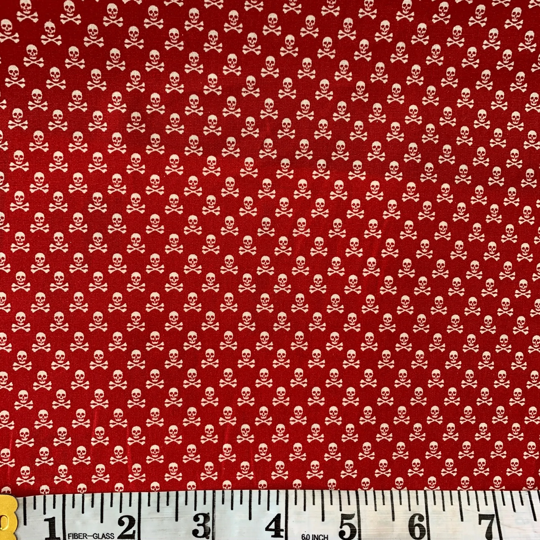 100% Cotton  - Mini Skull and Cross Bones - Red - Sold by Half Metre