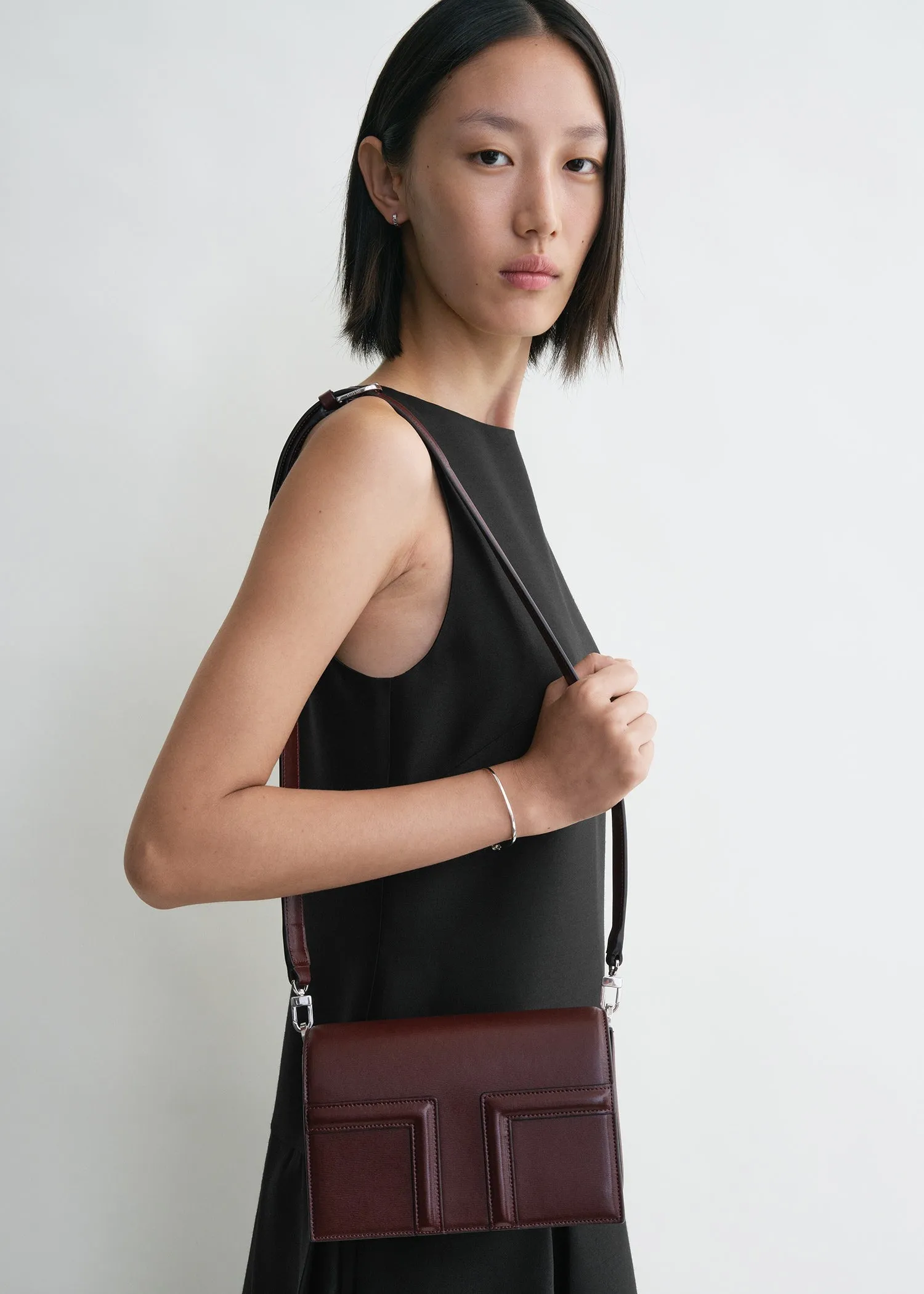 Mini T-flap leather bag bordeaux