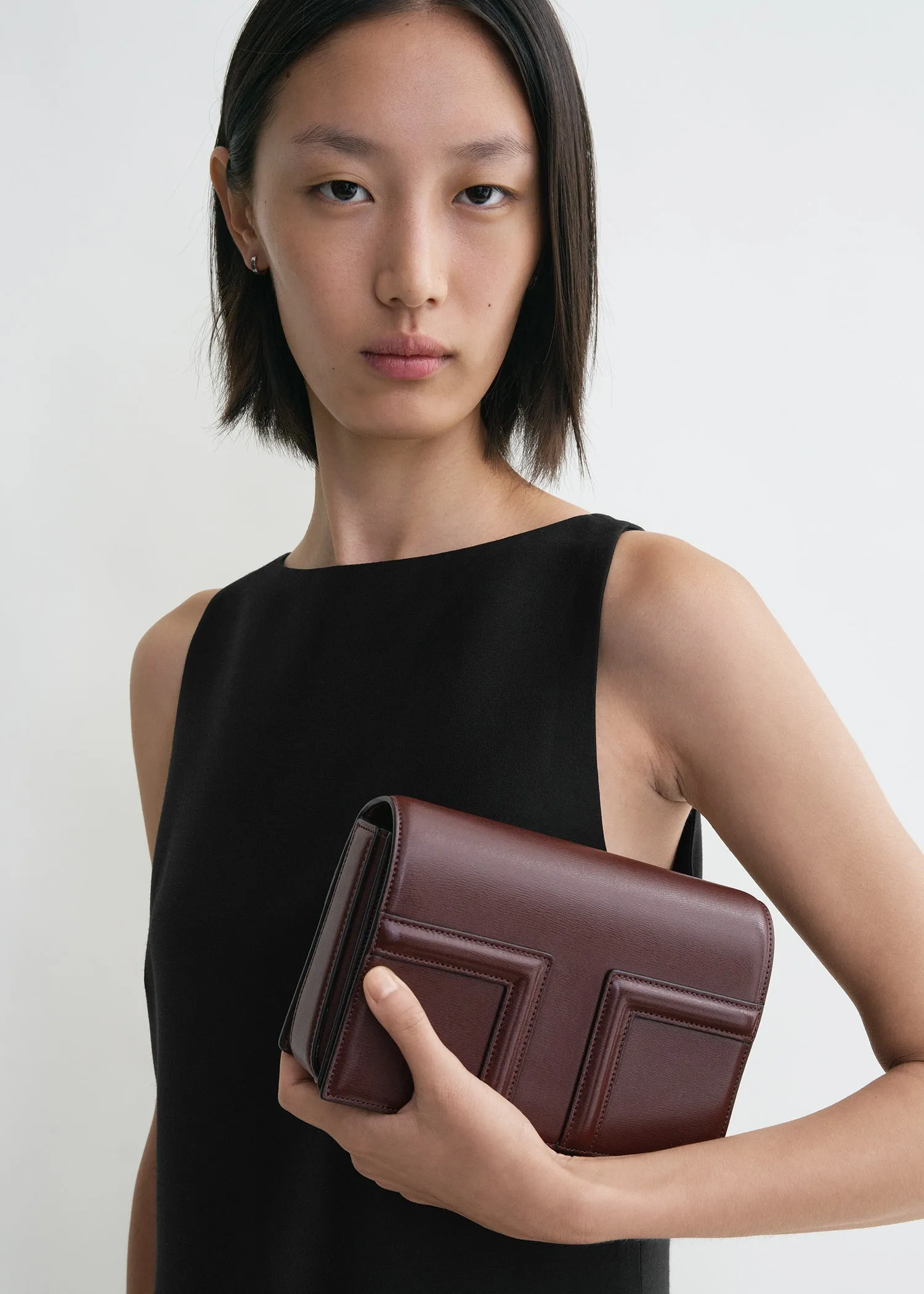 Mini T-flap leather bag bordeaux